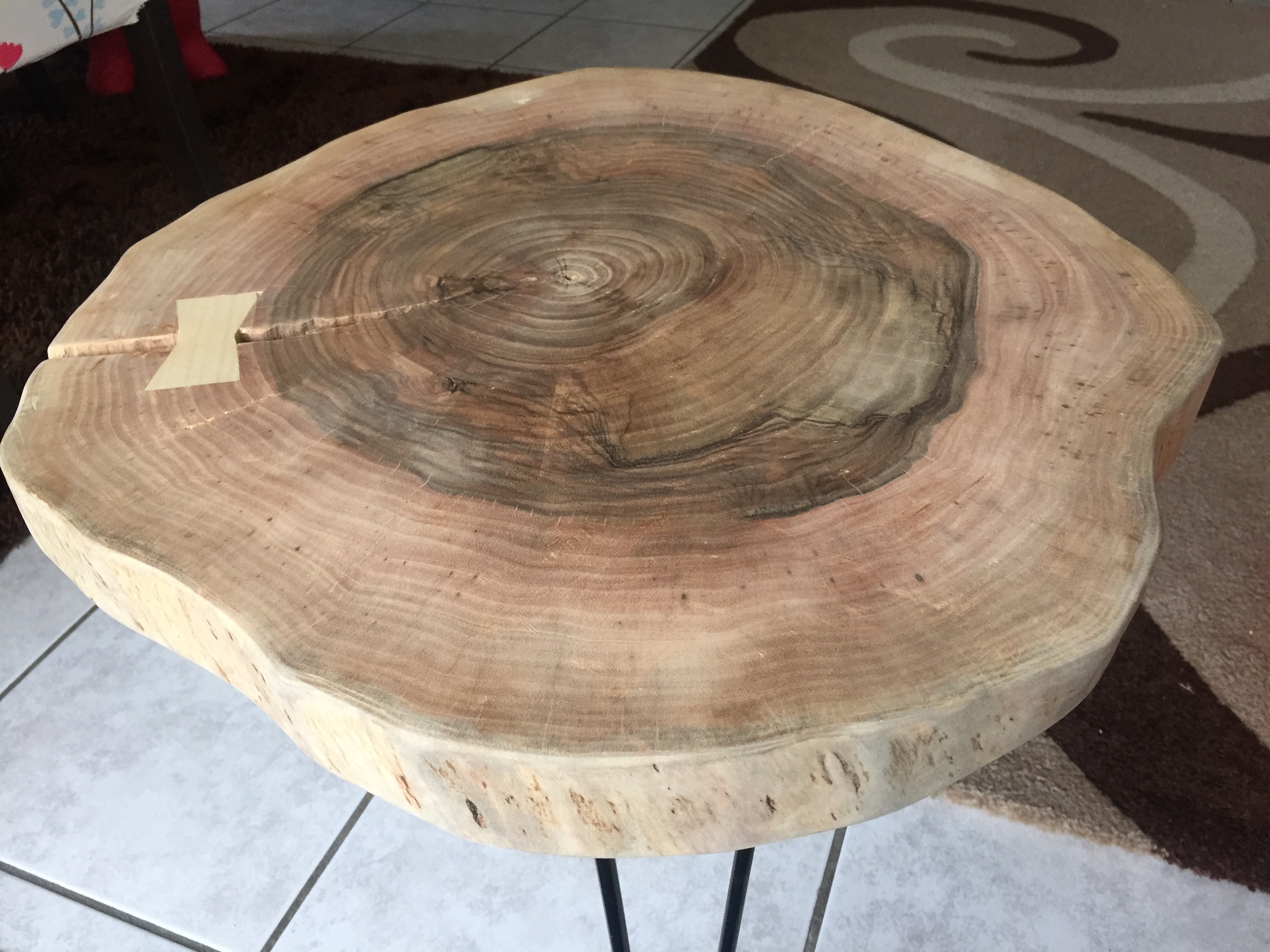 Table slab top view before final finish — growth rings visible